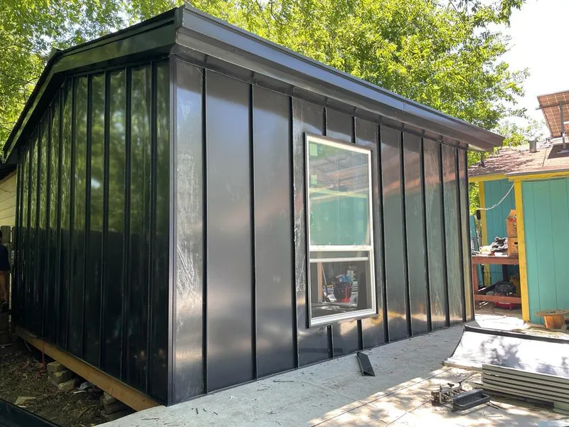 Black standing seam metal wall panels for Roof Inspection in Boonville